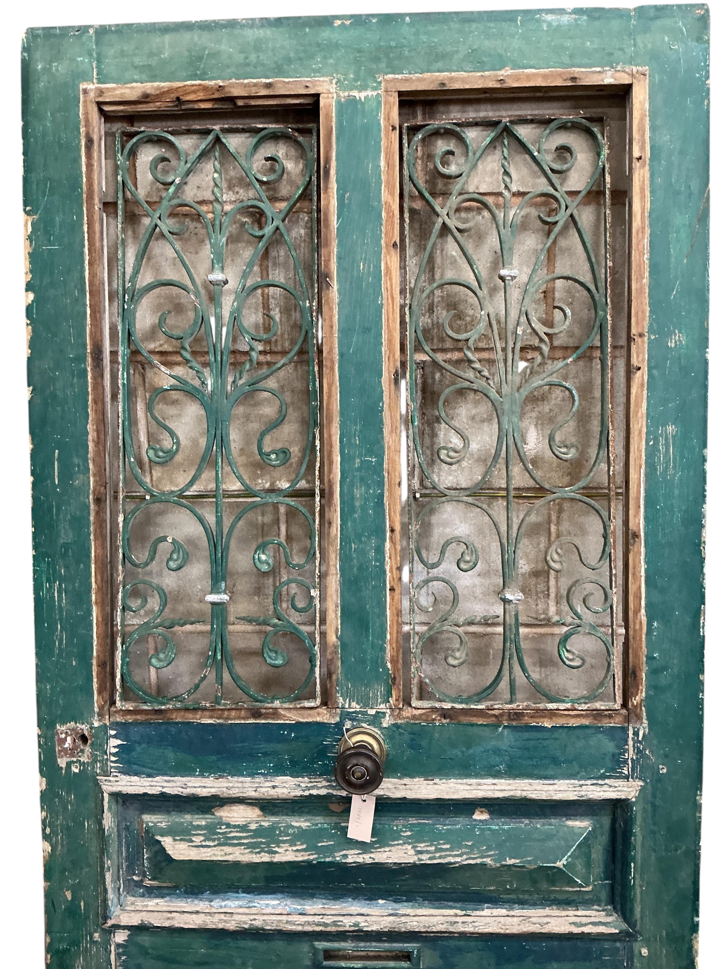A French door with grills and fan light, door width 101cm, door height 212cm